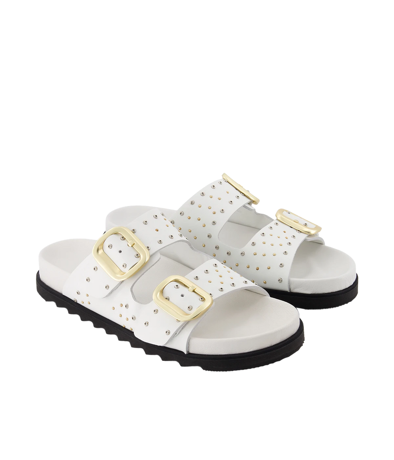 the Lexi Sandals are adorned with polished studs and eyelets, adding a touch of modern sophistication to this timeless design