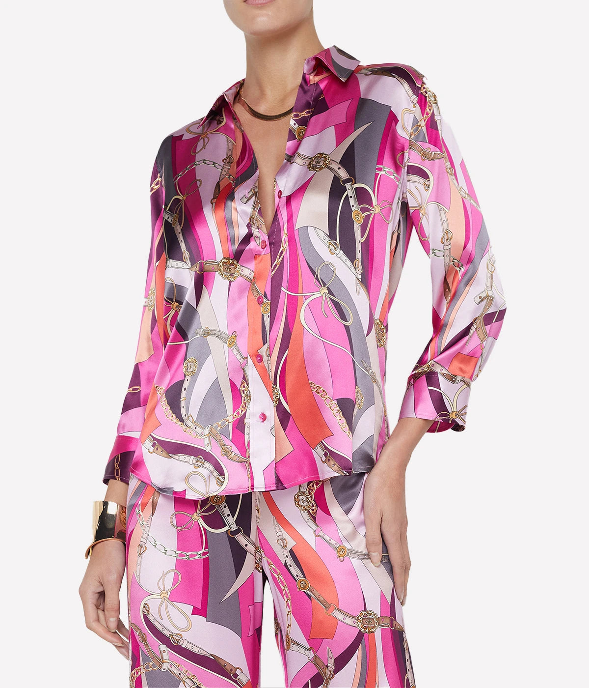 ALT Text: Silk Dani Blouse with three-quarter sleeves, a high-low hem, and 2-button cuffs for a sophisticated and versatile style.