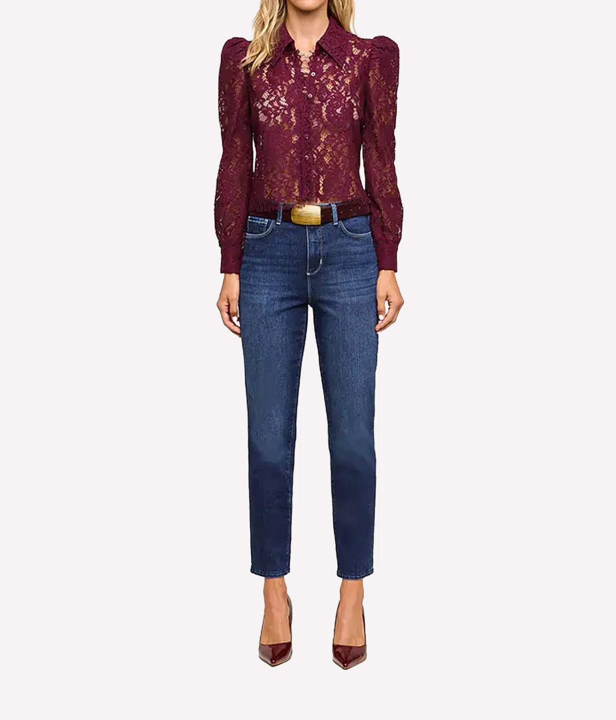 L'Agence Anita Lace Blouse In Deep Sangria - model wearing red lace blouse and blue denim jeans