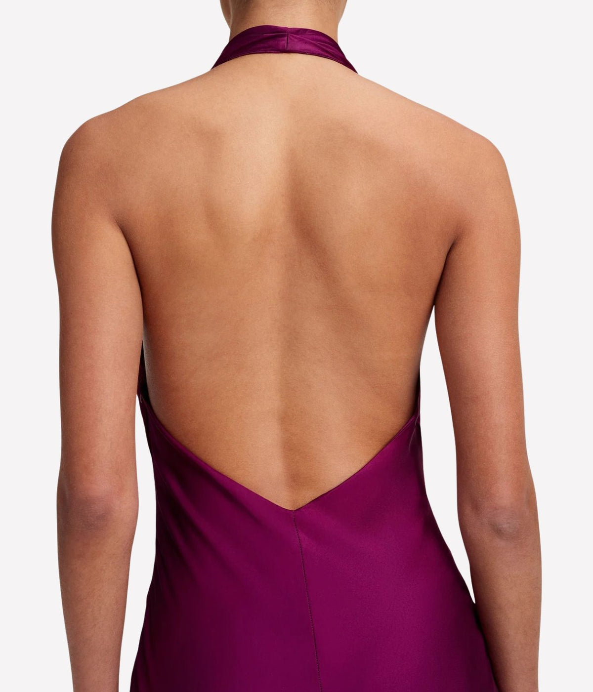 Close-up of A.L.C. Mabel Satin Gown in Jewel showing the halter strap and open back