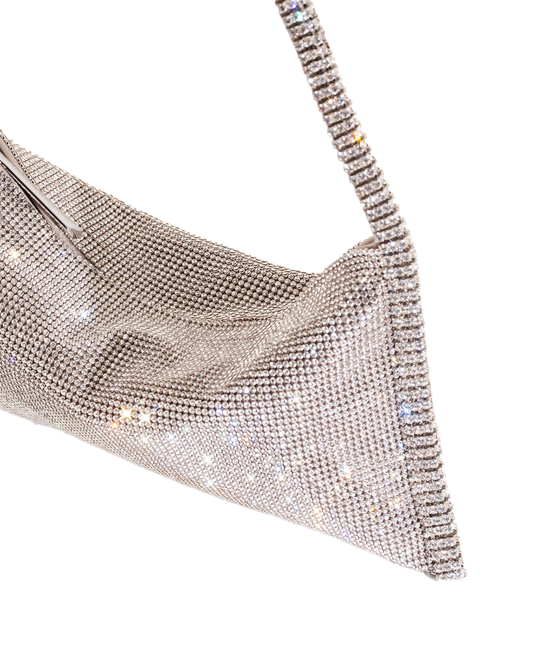 A close-up of a rhinestone-embellished shoulder bag in a triangular shape, featuring a textured rhinestone strap and a silver-toned metal zipper closure, set against a plain white background.
