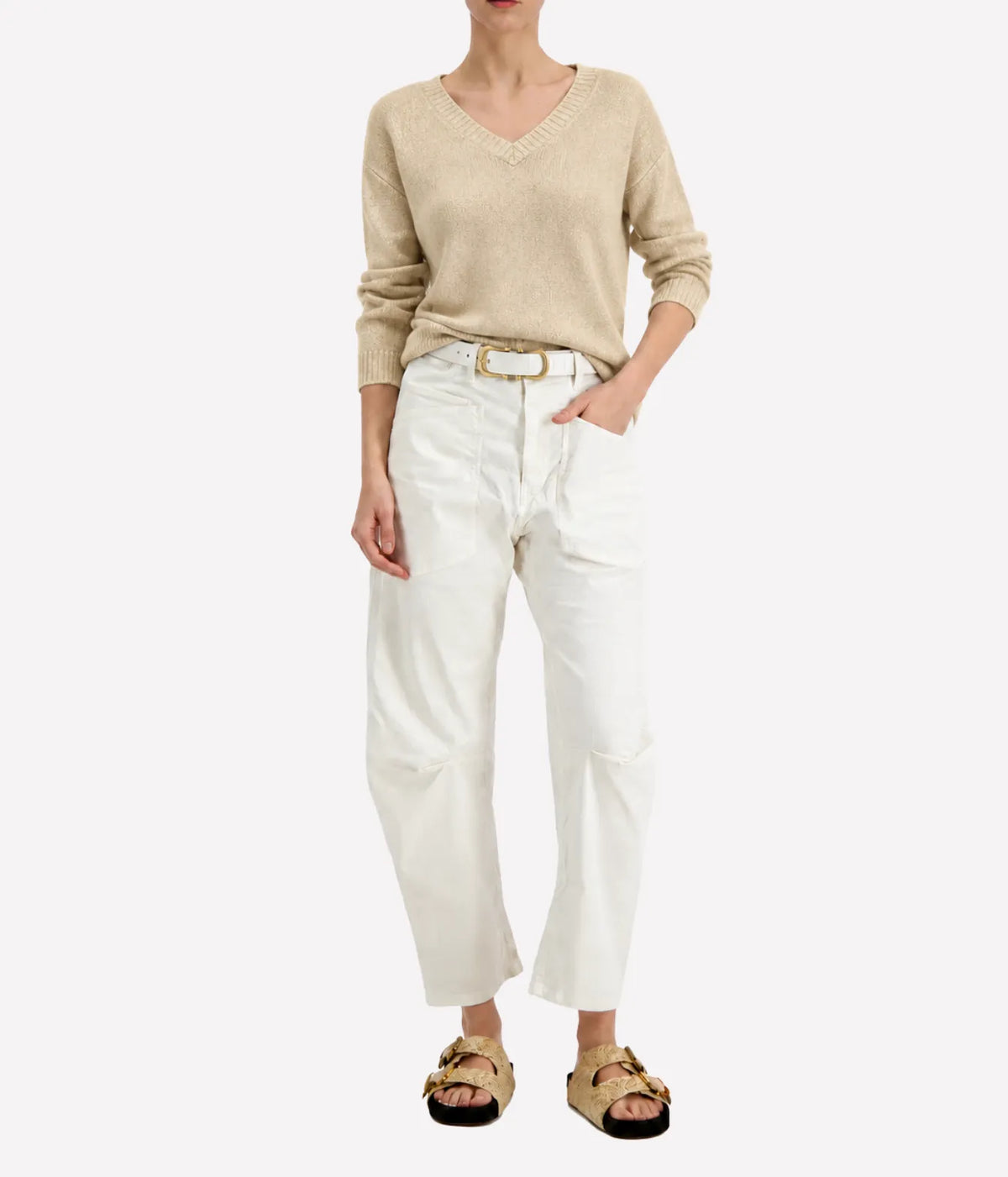Model wearing the Avant Toi V Neck Knitted Pullover in Burro, showing the dropped shoulders and ribbed cuffs