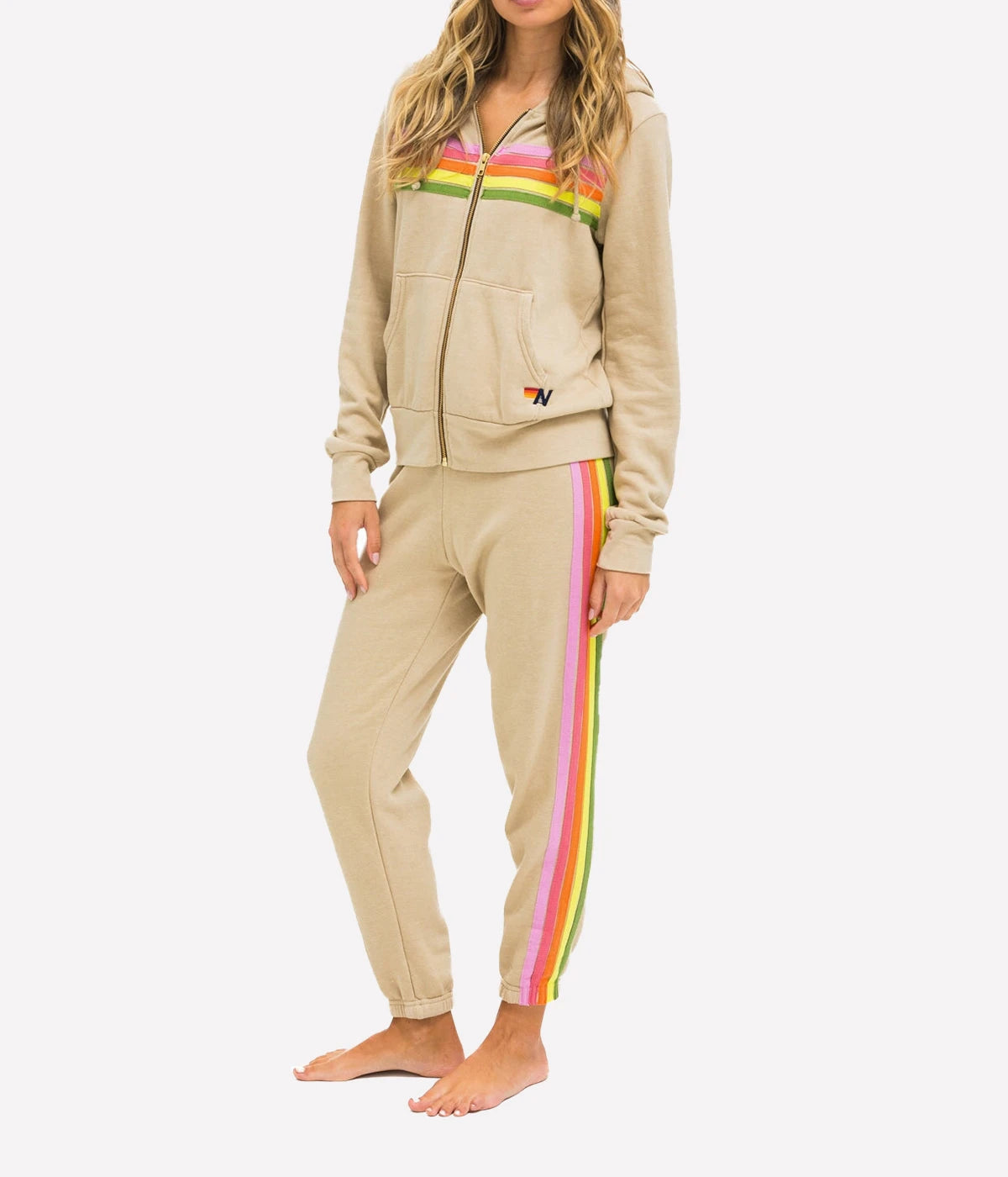 Relaxed-fit vintage tri-blend sweatpants with a classic stitch detail, styled with a hoodie and sneakers for a casual, comfortable look.