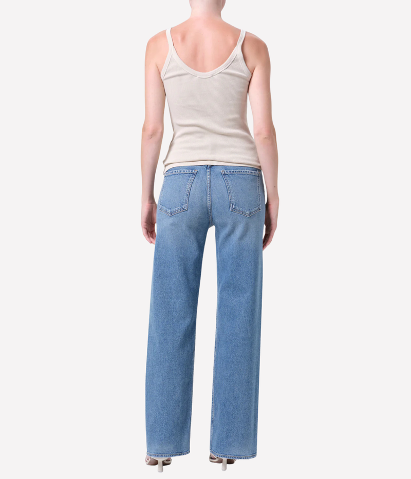 Back view of AGOLDE Ren 32 Jean in Measure showcasing the relaxed fit and washed-out indigo denim.