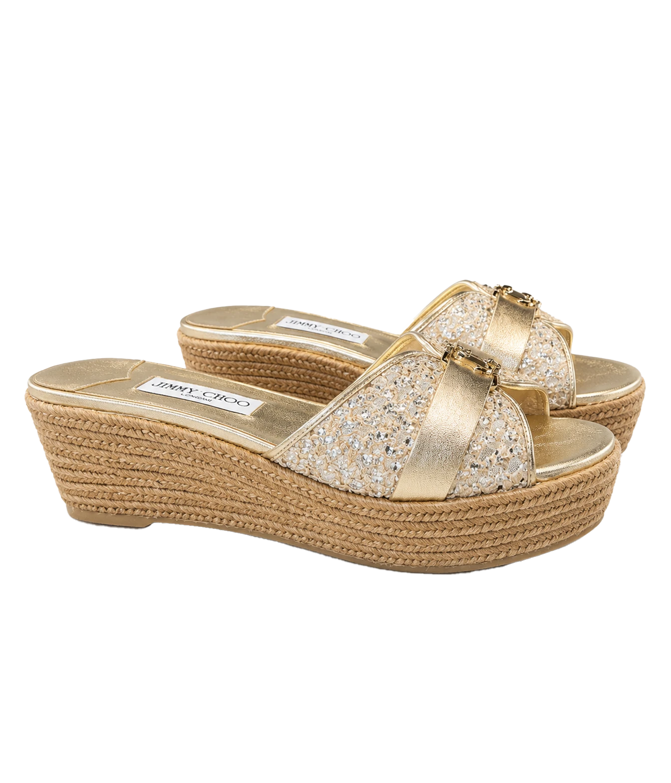 A pair of gold wedge espadrille sandals with glittery straps and a woven jute platform sole, shown on a plain white background.