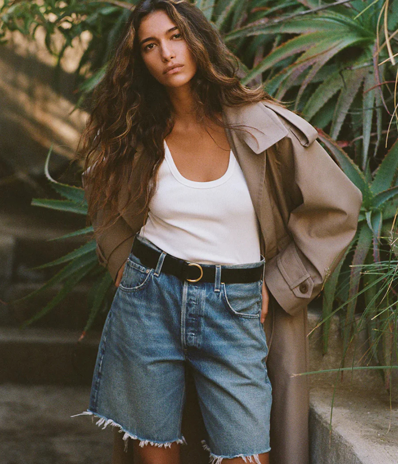 Lifestyle shot of a model wearing the Citizens of Humanity Ayla Short in Gemini styled with elevated everyday essentials.