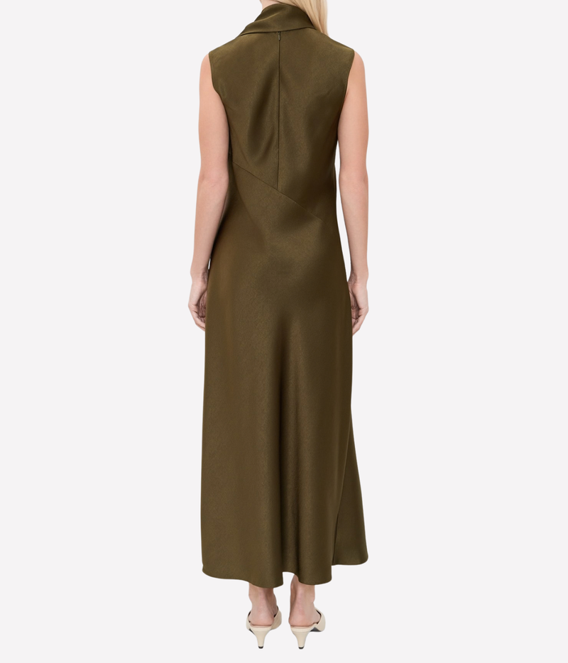 Back view of a model wearing the Vince Draped Scarf Tie Dress In Cypress, showing the high neck and scarf tie at the back