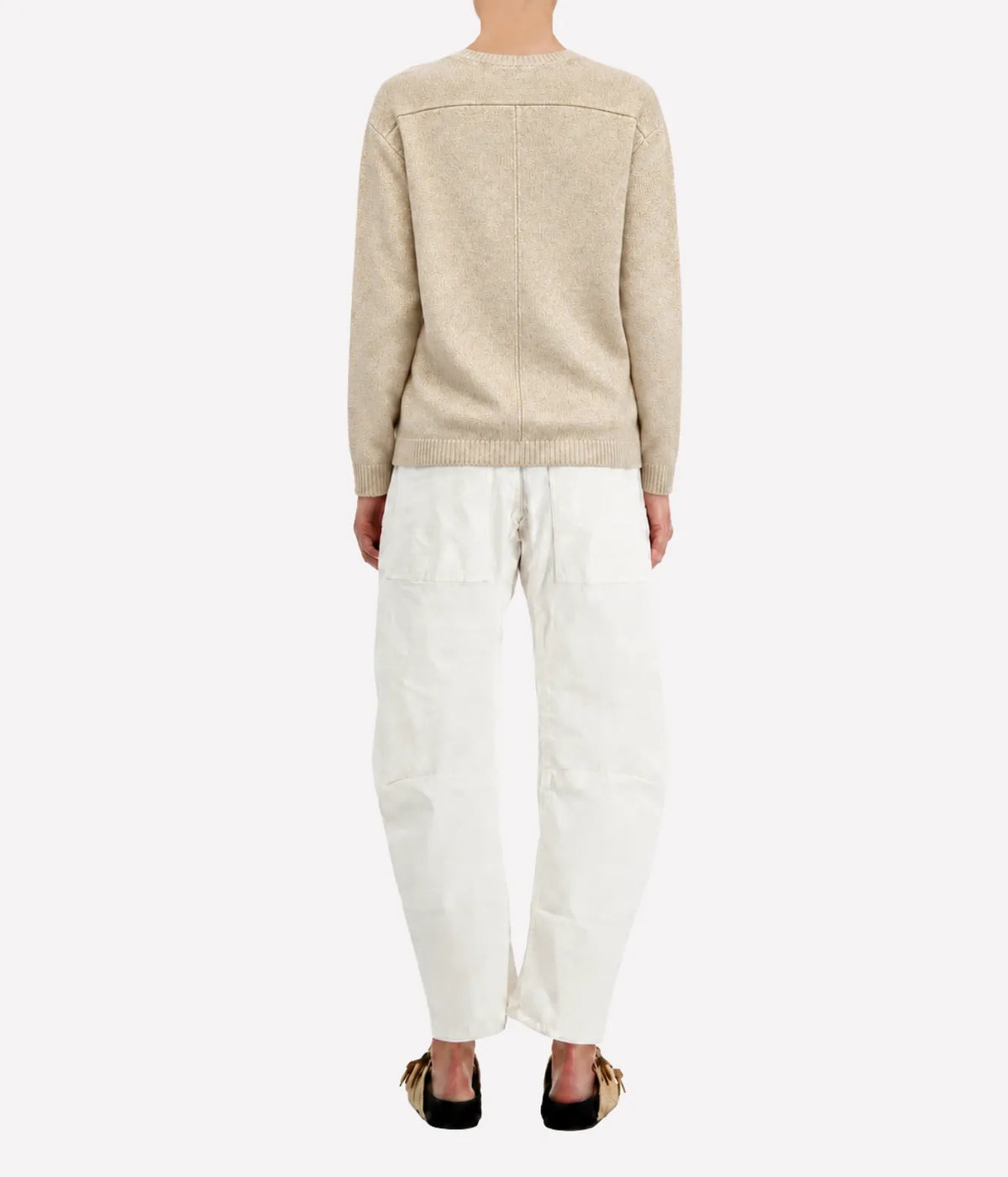 Model wearing the Avant Toi V Neck Knitted Pullover in Burro, showing the hand-painted gold finish