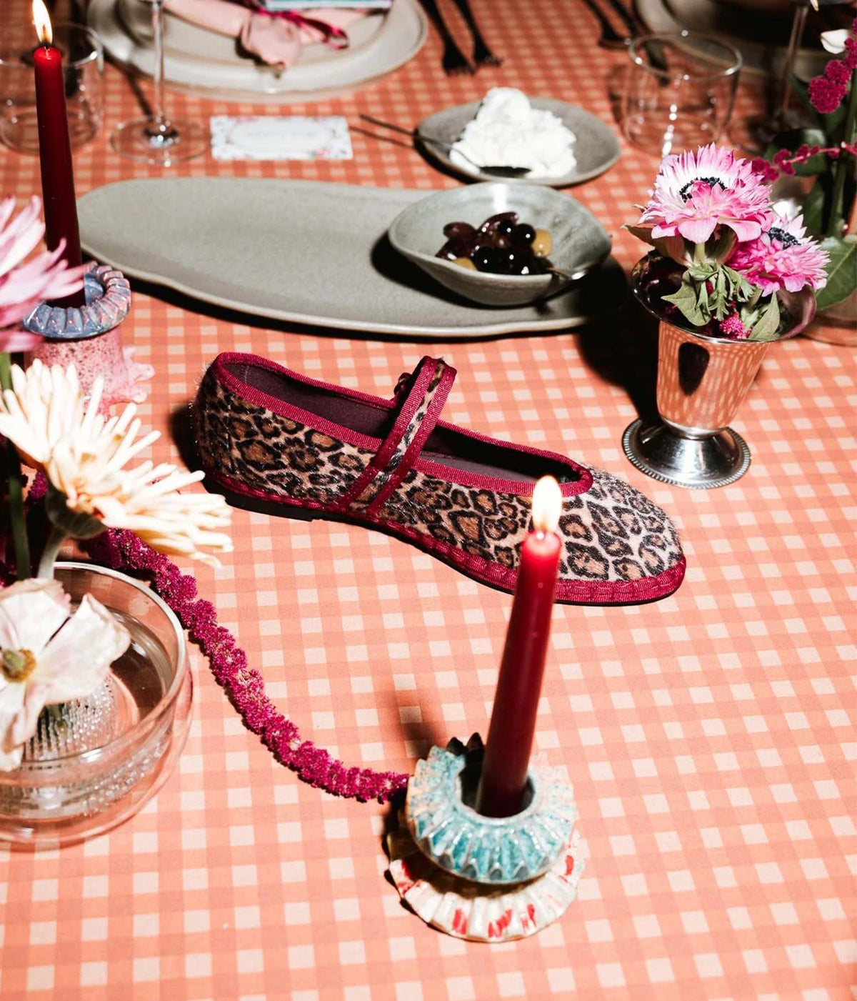 Single Flabelus Pierre Mary Jane in Leopard Garnet shown side-on, featuring the leopard print upper, contrast garnet piping and slim garnet buckle strap