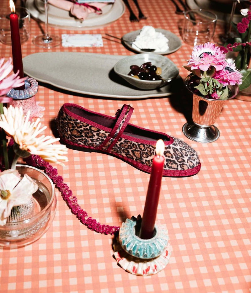 Single Flabelus Pierre Mary Jane in Leopard Garnet shown side-on, featuring the leopard print upper, contrast garnet piping and slim garnet buckle strap