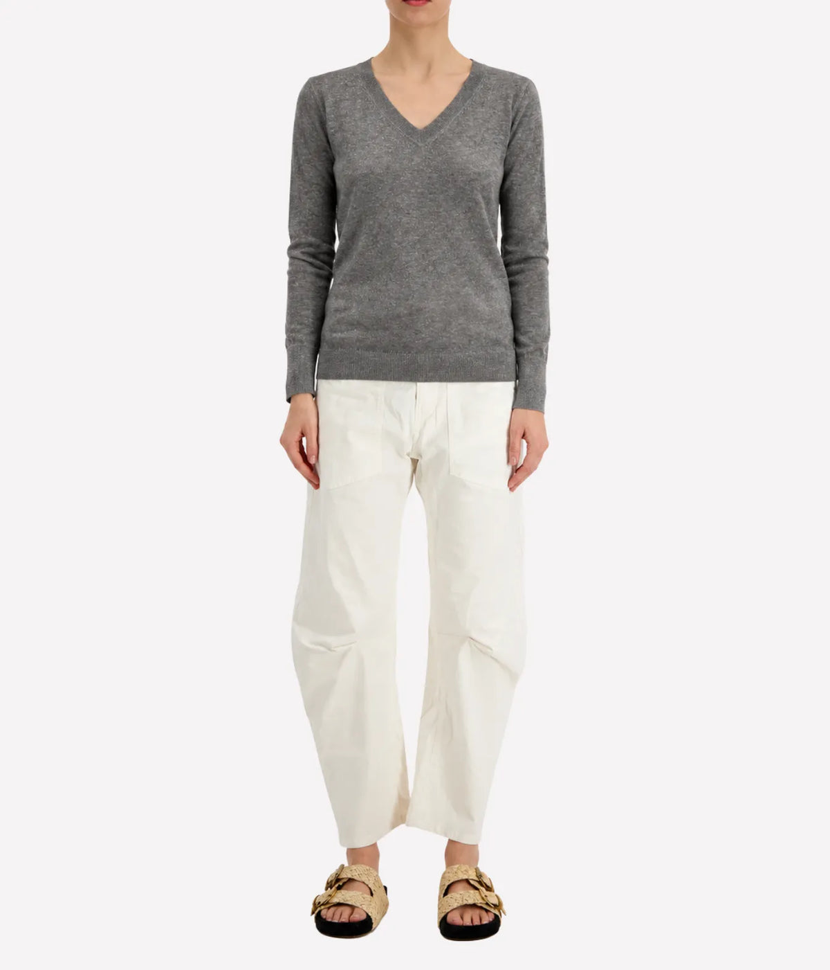 Model wearing the Avant Toi Knitted Pullover in Fango, showing the close, streamlined fit