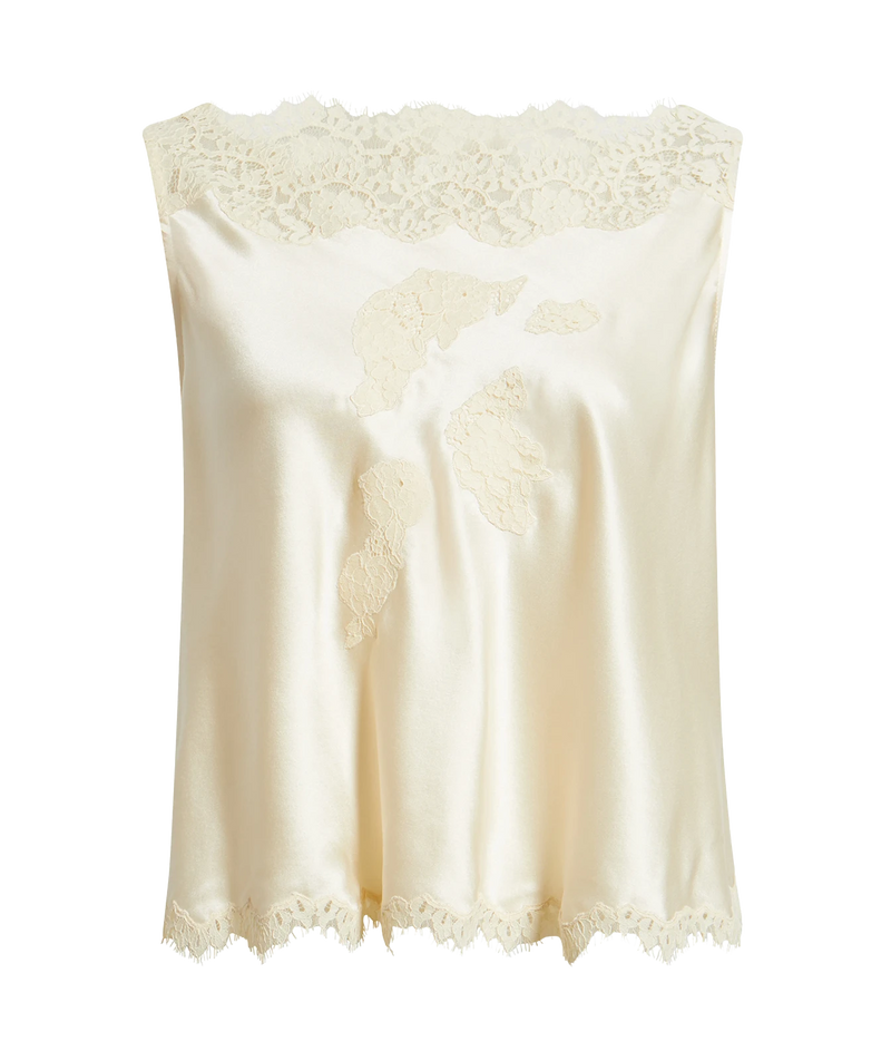 An ivory satin slip top with lace trim at the neckline and hem, featuring embroidered floral details on the front, shown against a plain white background.