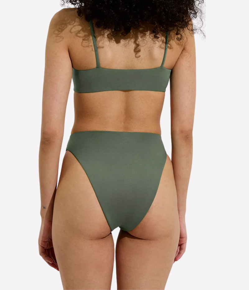 A model shown from the back wearing a solid olive green two-piece bikini featuring the Left On Friday Pool Days Top in Agave