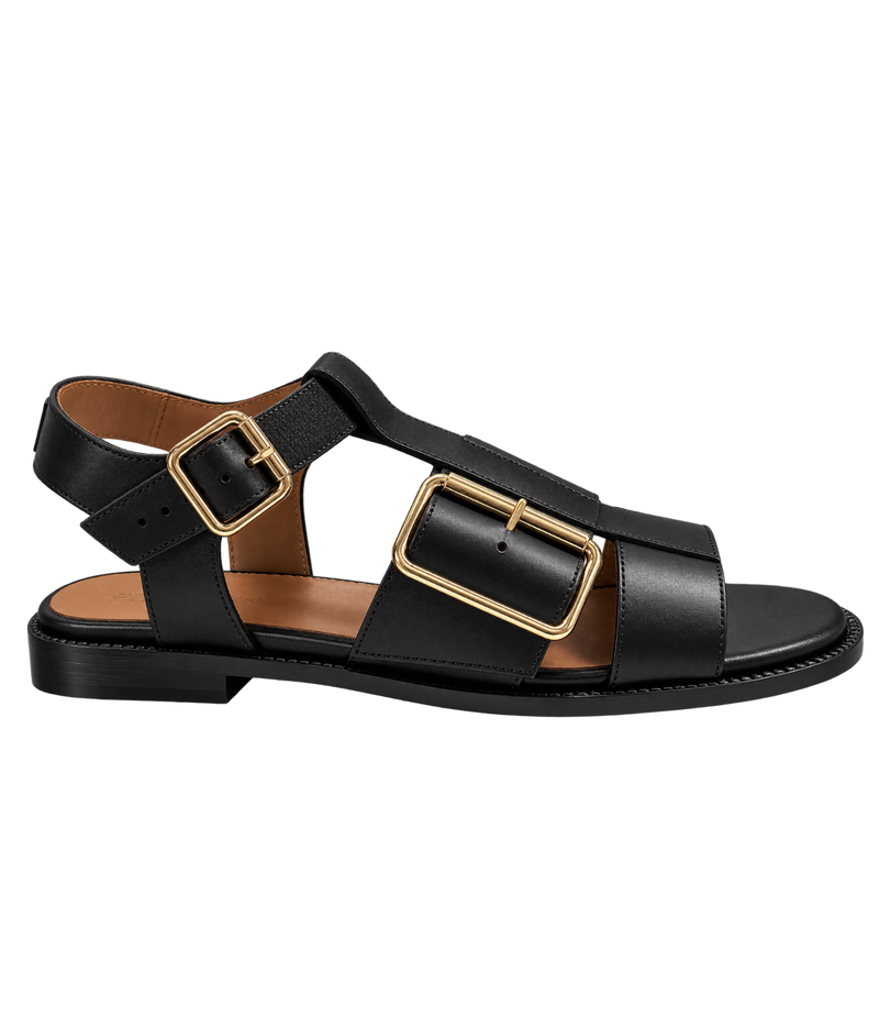 A black leather double-strap sandal with large gold-tone buckle details, shown in a side profile - Anthology Paris Rosilda Sandal in Noir