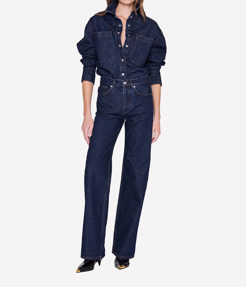 Full body shot of model wearing the Anine Bing Hugh Jean in Unwashed Blue styled with a matching dark denim shirt.