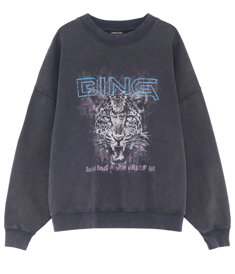 A washed black crewneck sweatshirt featuring a graphic print of a leopard with the text 'bing'