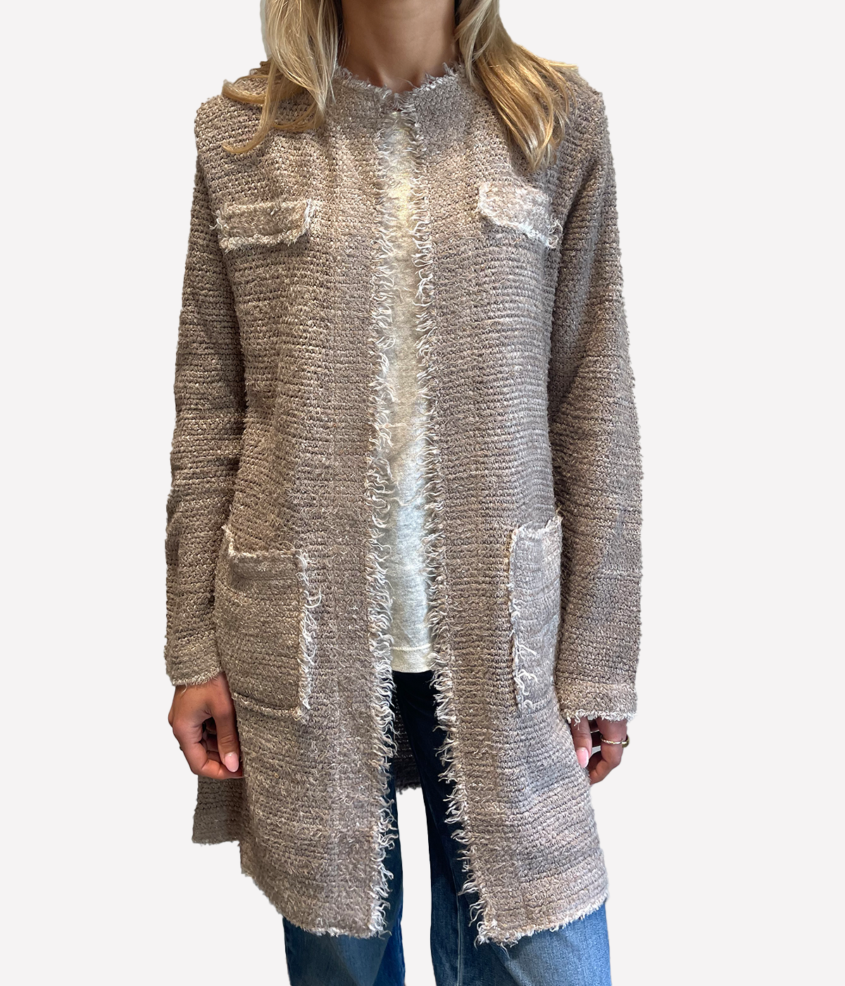 ALT text: Model wears long hand-painted stitch jacket in warm brown ‘Noce Moscata’ with tonal contrast stitching and open front design