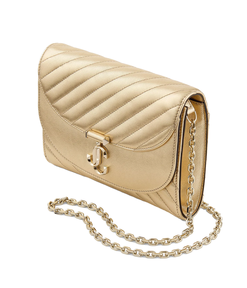 Ava Curve Clutch In Shiny Gold