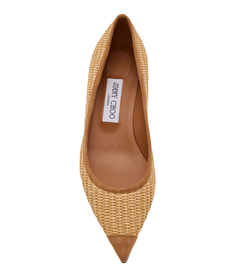 A single Jimmy Choo London pointed-toe flat shoe in a woven beige straw-like material with a tan suede cap toe and tan interior, shown from a top-down view on a white background.