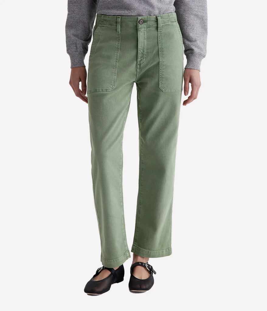 A high-rise straight crop with workwear-inspired pockets, featuring a subtle utilitarian look, crafted from soft sulfur-dyed green shade denim by AG. 