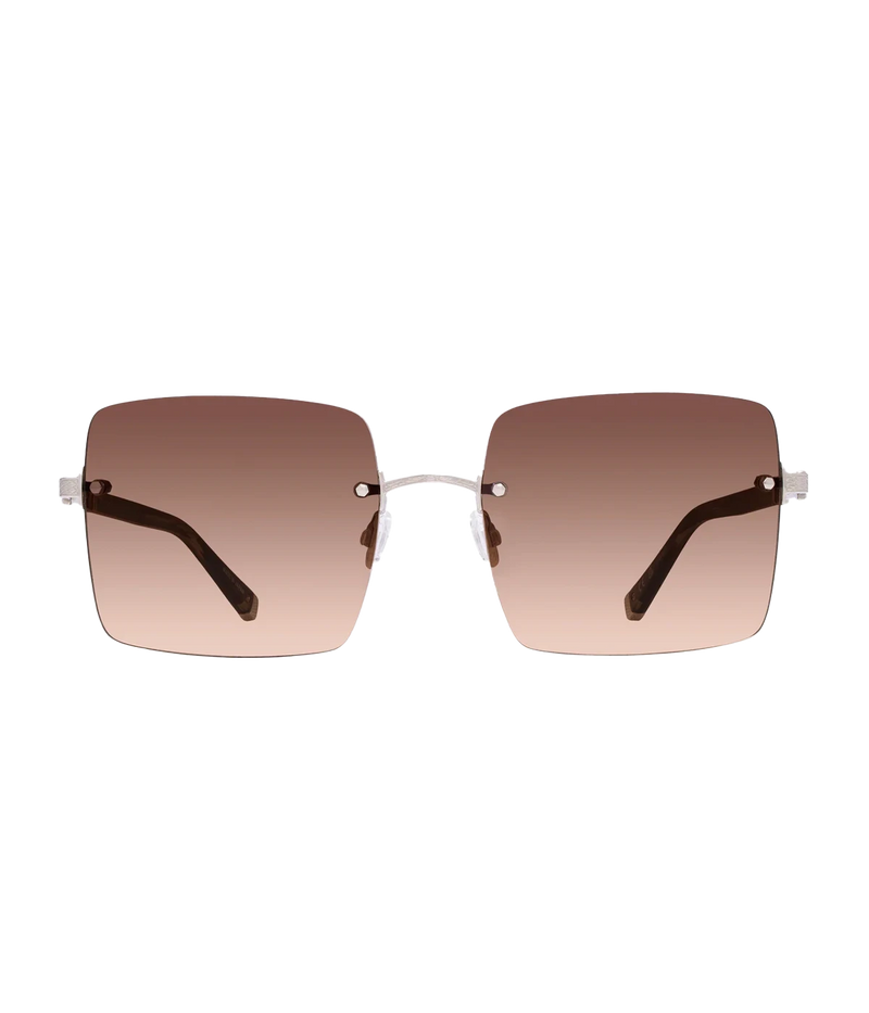 A bold sunglass, in a rose gold hue in a chic butterfly silhouette, made in Japan, 24K gold plated, throw on and go, one of a kind, comfortable, neutral sunglasses, 90s inspired. 