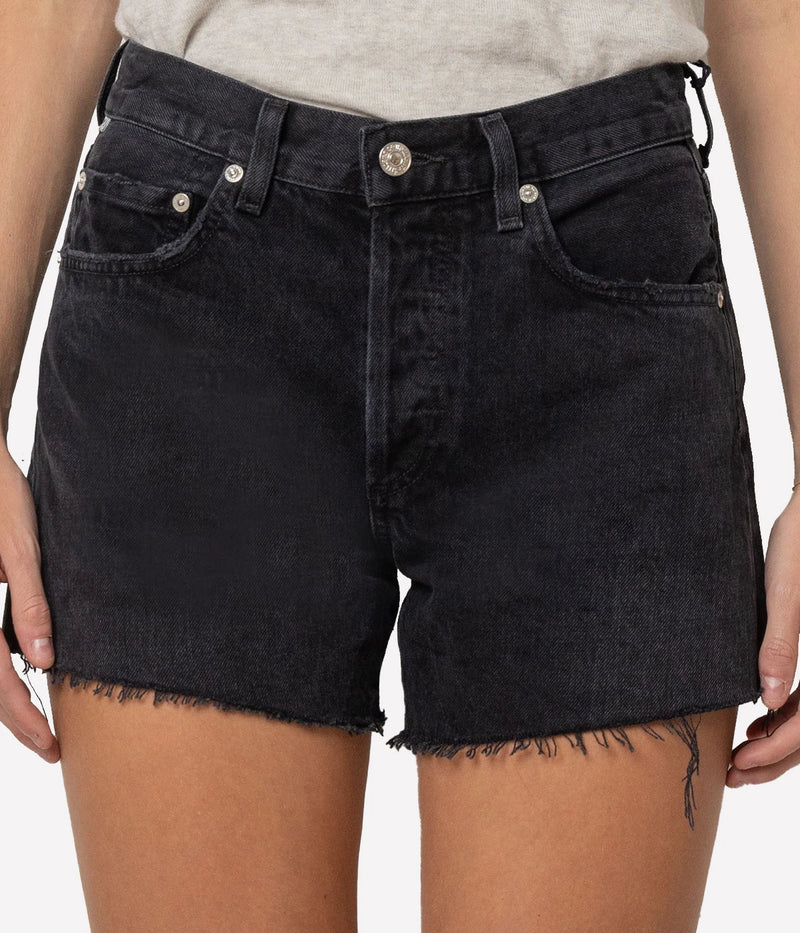 Citizens of Humanity Annabelle Long Short Jean in Black Sea worn on model, cropped front view showing longline denim shorts and fit