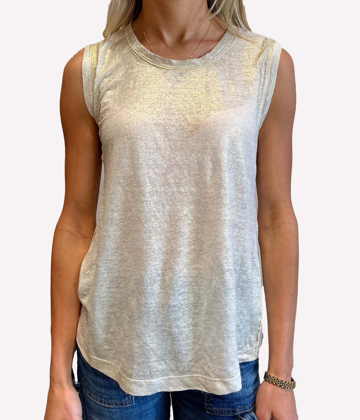 ALT text: Model wears hand-painted linen tank top in metallic gold with raw edge hem and scoop neckline