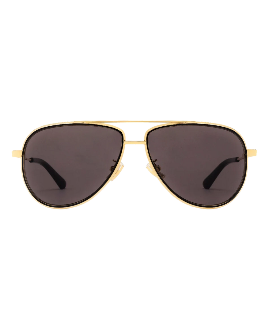  A timeless pair of aviator sunglasses, with gold wire frame and black lens. Made in Italy, summer staple, luxury eyewear, modern sunglasses. 