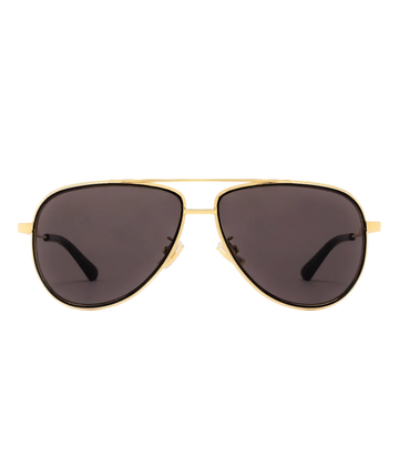  A timeless pair of aviator sunglasses, with gold wire frame and black lens. Made in Italy, summer staple, luxury eyewear, modern sunglasses. 