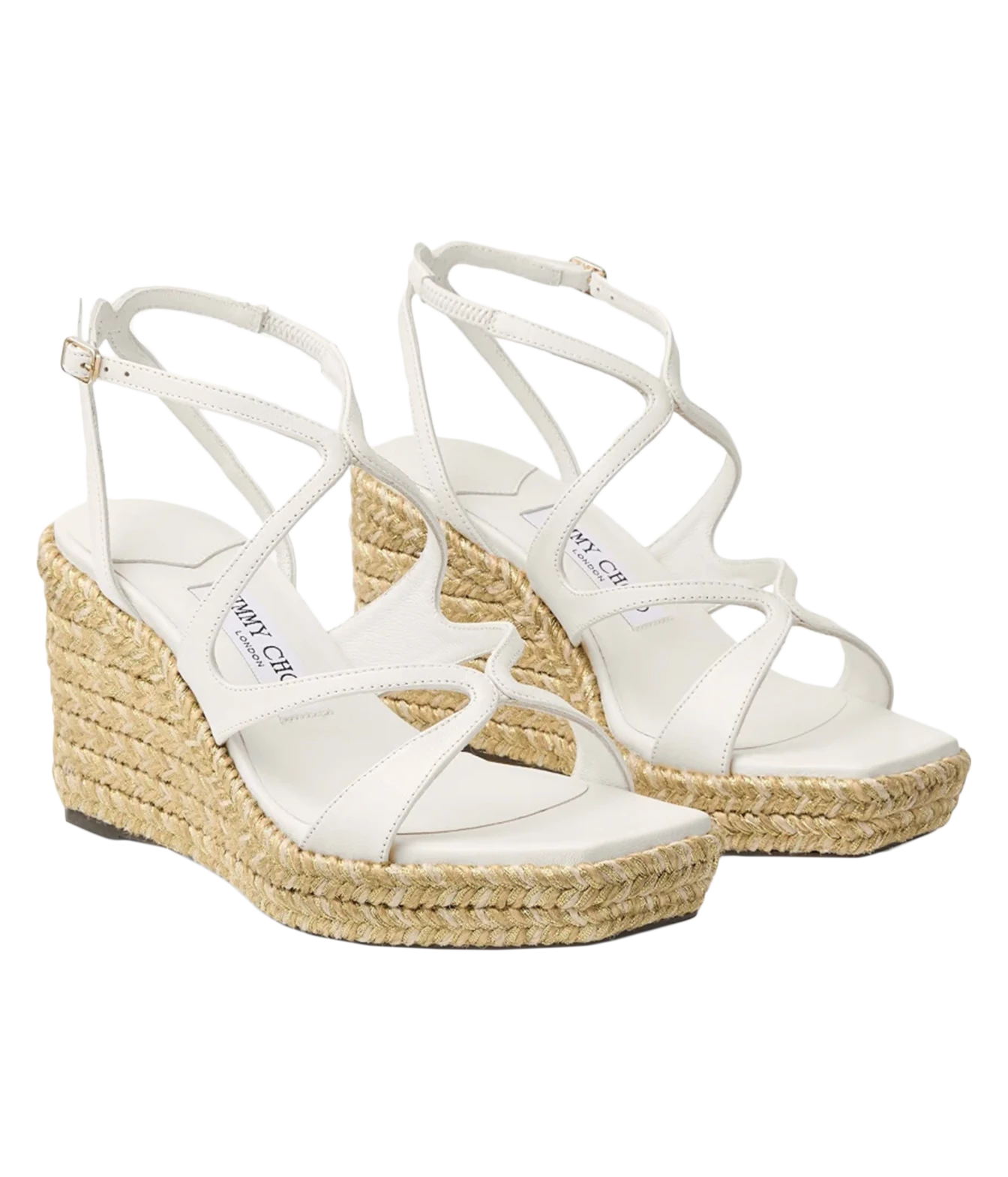 A pair of white strappy wedge sandals with woven jute espadrille soles, shown on a plain white background.