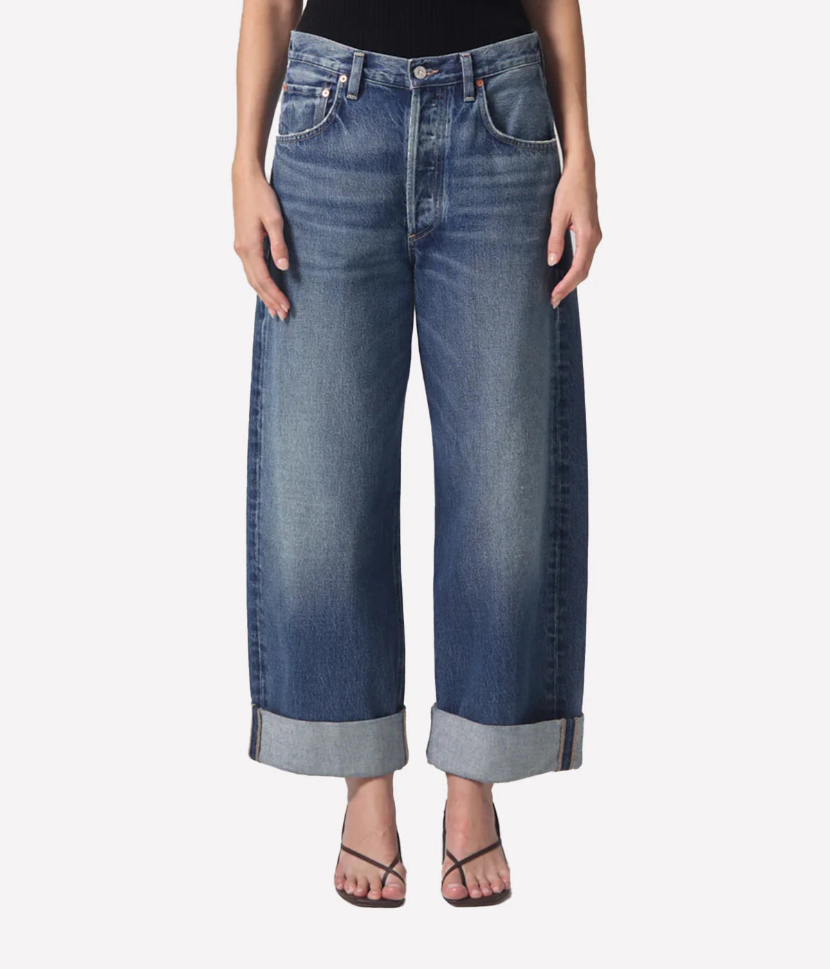  Relaxed-fit Ayla Jeans with a cuffed leg, styled with an oversized blazer and boots for a chic, vintage-inspired look.
