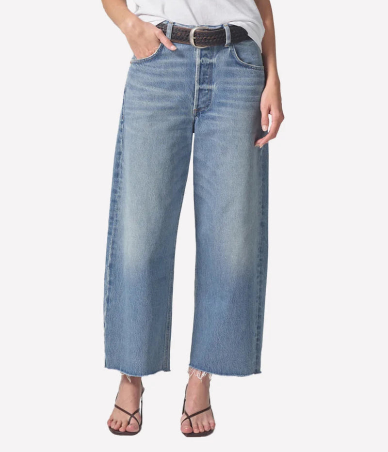 Lower-body view of Citizens of Humanity Ayla Raw Hem Crop Jean in Sodapop showcasing the cropped silhouette and raw hem detail.