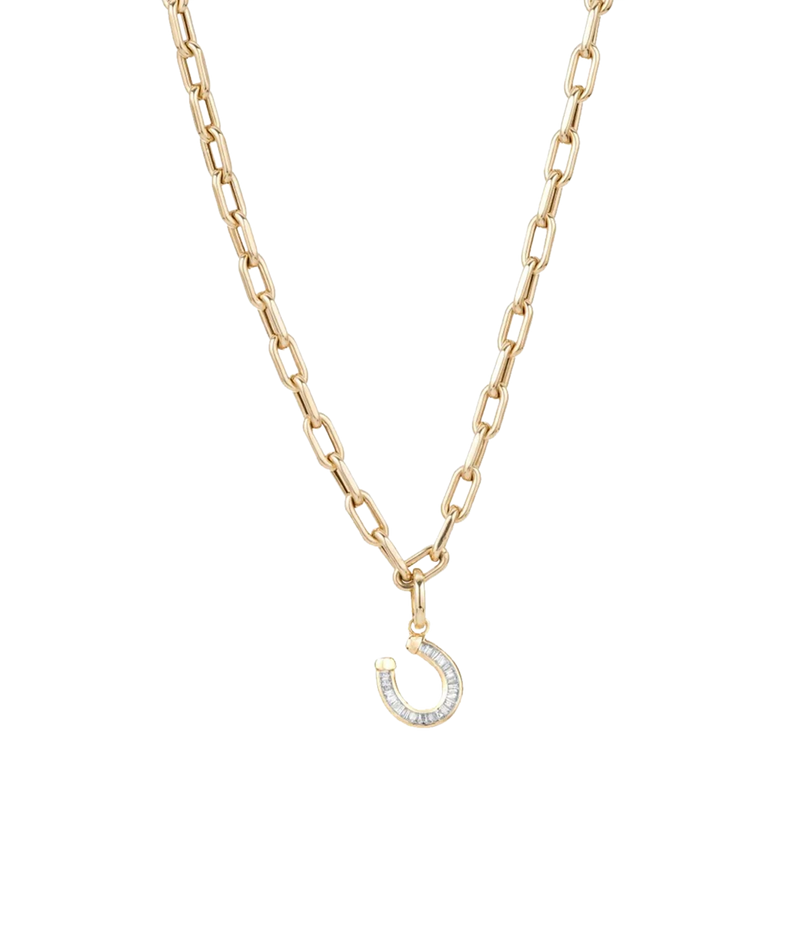 Adina Reyter Baguette Horseshoe Charm in 14k Yellow Gold on a fine gold paperclip chain, with the chain falling in a wider V