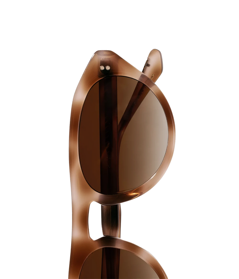 Close-up of the KREWE Billie Sunglasses in Blush Tortoise, showing the folded temple and hinge detail