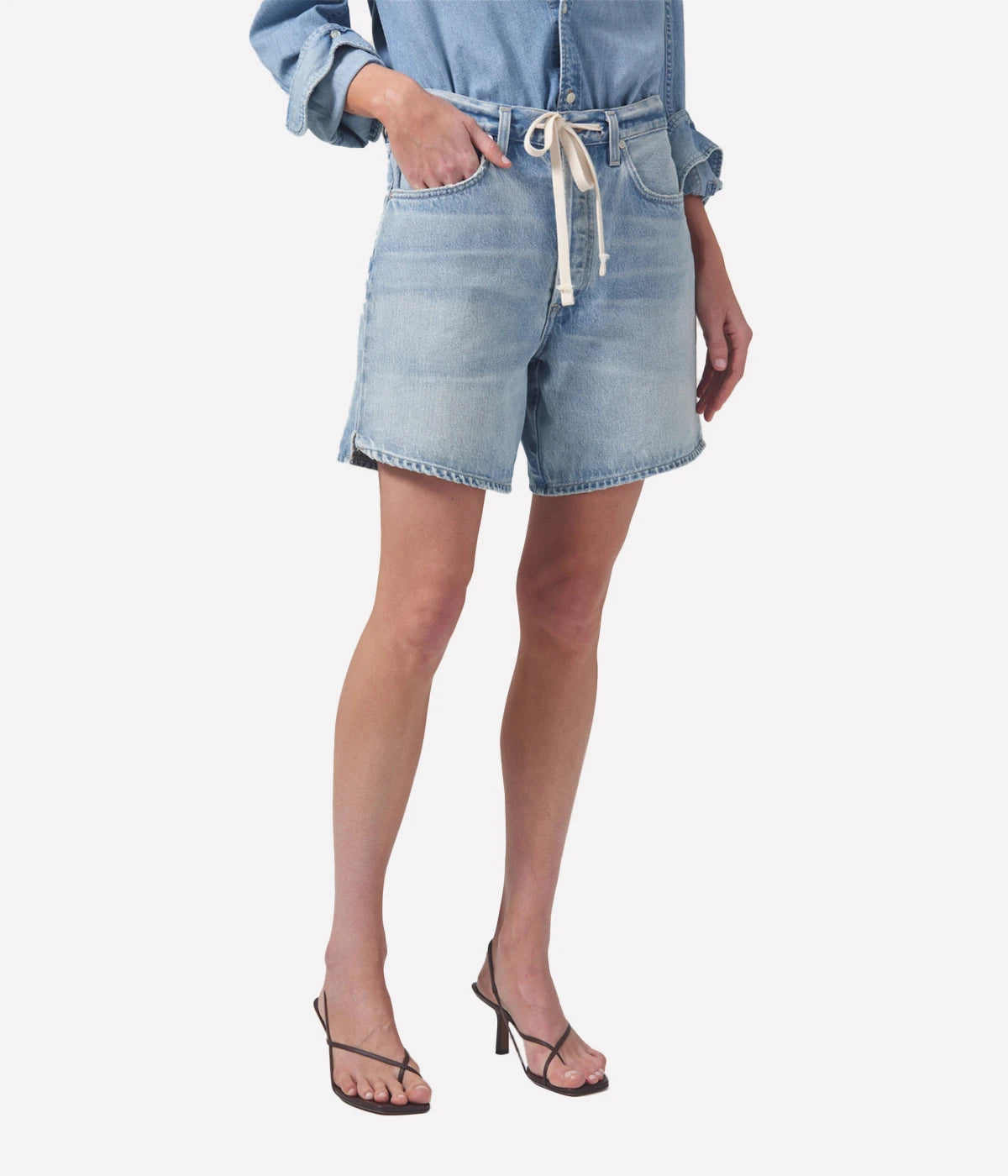 ALT Text: Brynn Short in light vintage indigo, featuring a relaxed fit, drawstring waistband, and finished hems, crafted from 100% regenerative cotton for a soft, breathable feel.