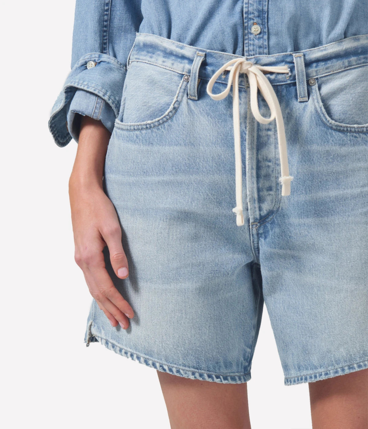 ALT Text: Brynn Short in light vintage indigo, featuring a relaxed fit, drawstring waistband, and finished hems, crafted from 100% regenerative cotton for a soft, breathable feel.
