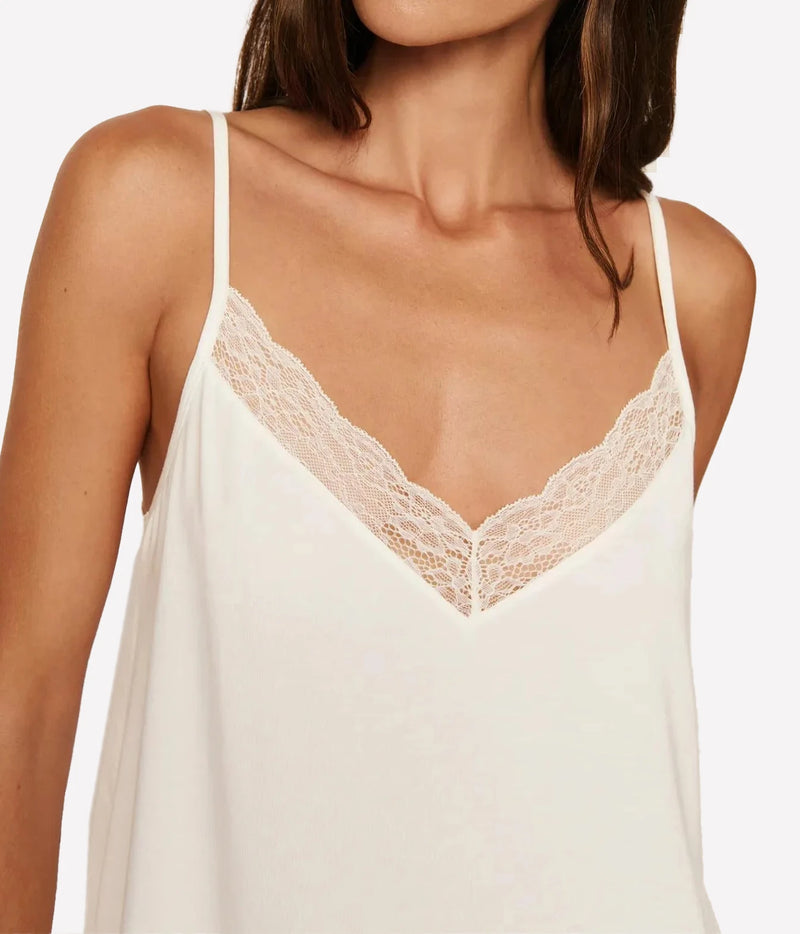 Detail of the Eberjey Kari Cami & Pant Pj Set in Ivory showing the delicate lace trim along the V neckline and straps
