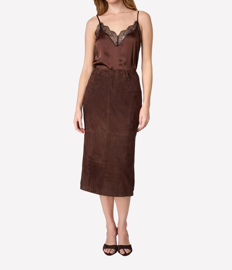 Full-length view of model wearing Cami NYC Daisy Silk Camisole in Umber with a brown midi skirt