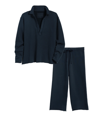 A easy travel set in navy, with a long sleeve Henley style top and cropped drawstring trousers. Comfortable, bra friendly, Travel friendly set, long sleeves, throw on and go, airport outfit, made in Los Angeles. 