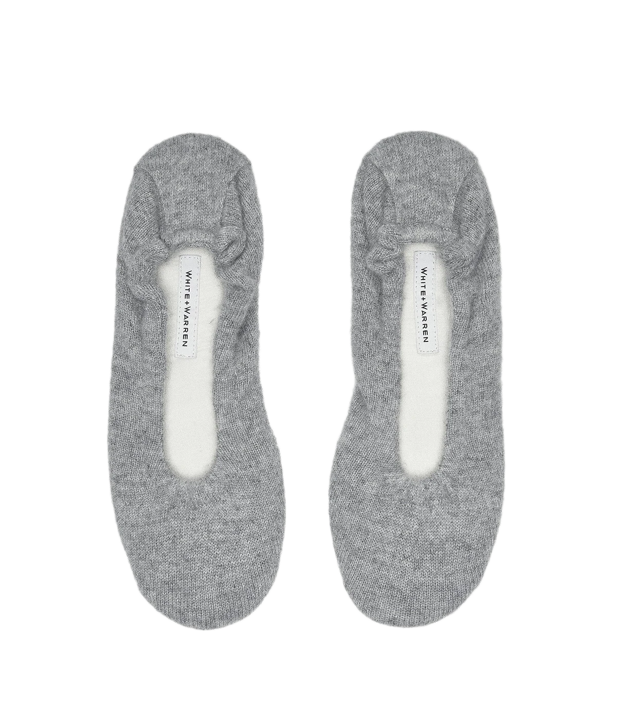 ALT text: White + Warren cashmere ballet slippers with cushioned sole, styled with matching robe and eye mask for a cosy, luxurious loungewear look.