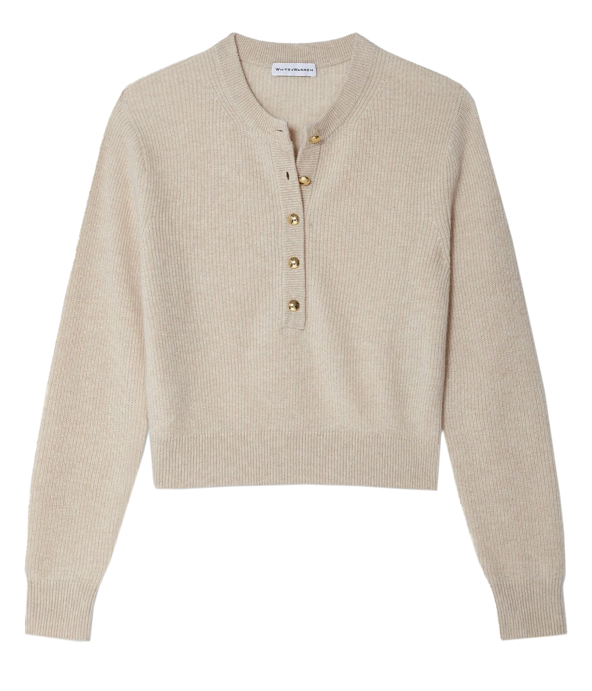ALT text: White + Warren ribbed cashmere Henley with gold buttons, styled with denim and a blazer for a polished daytime look.