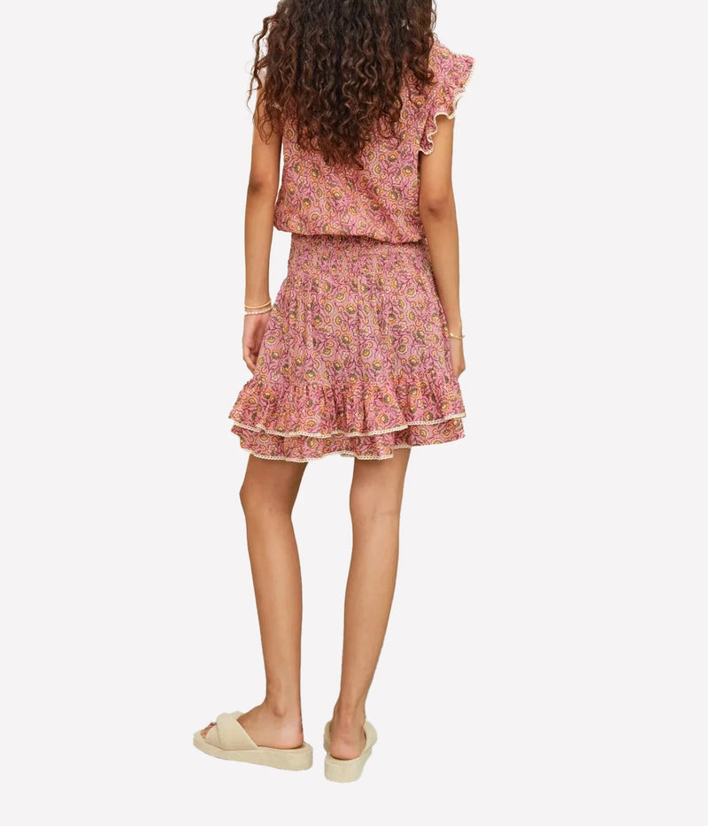 Model wearing the M.A.B.E Ceci Print Mini Skirt and matching Ceci Top in Pink – back view