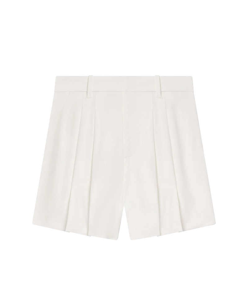 Polished Soft Suiting Fabric: The blend of viscose, wool, and elastane creates a soft yet structured feel that’s both comfortable and refined.
Elegant Pleating & Wide Legs: The pleated front adds a touch of sophistication, while the wide-leg cut provides an effortlessly chic fit.
Versatile Styling: The crisp white color makes these shorts easy to pair with everything from casual tees to tailored blazers, perfect for both day and evening looks.