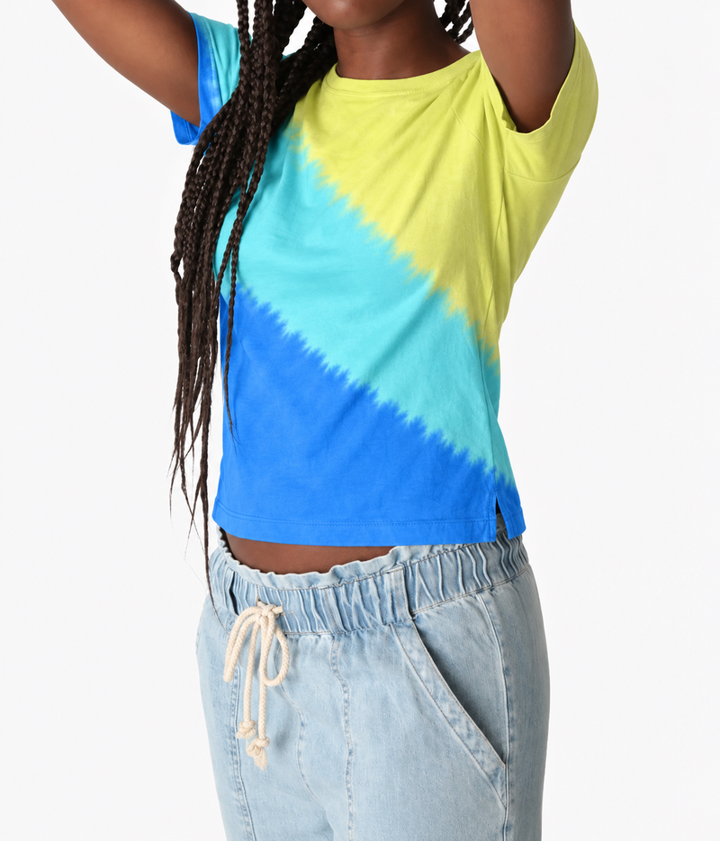 Electric & Rose - Everyday Ombre T-Shirt in Chartreuse Multi - close up model image with model wearing green and blue t-shirt and denim look pants