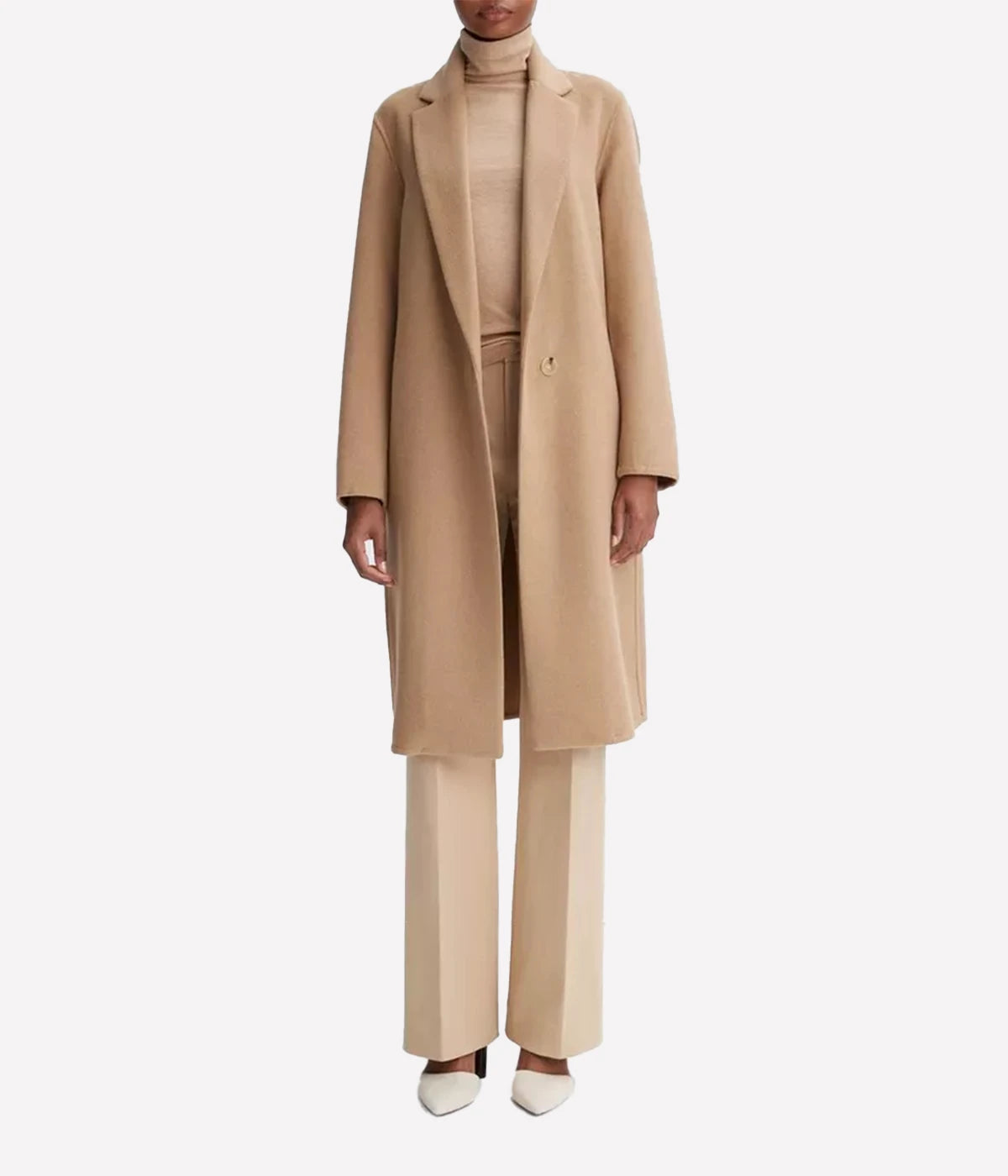 Sustainable Material: Made from a premium blend of 55% recycled wool, 40% polyester, 4% nylon, and 1% viscose, this coat prioritizes eco-friendliness without sacrificing quality or style.
Classic Design Elements: Featuring notched lapels, a concealed button-front closure, and side-seam pockets for both functionality and elegance.
Versatile Length: At 43 inches, this coat provides ample coverage while maintaining a sleek profile that can be dressed up or down.
Comfortable Lining: Lined with 100% polyester 