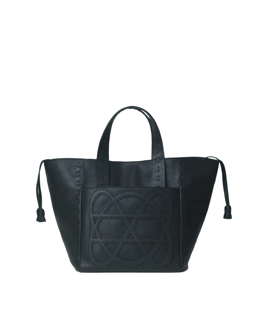 An everyday small tote bag in black, featuring 100% calf leather, logo patch on pocket,  weaved handles, removable adjustable shoulder strap, canvas lined, internal pocket, zip closure, woven hand stitch detail, tassel. Made in Greece, luxury leather, everyday work bag, mum bag throw on and go, Loewe inspired bag. 
