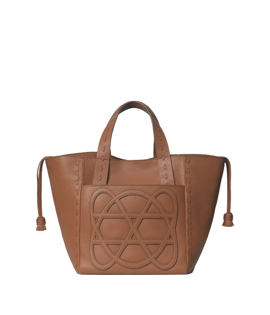 An everyday small tote bag in caramel, featuring 100% calf leather, logo patch on pocket,  weaved handles, removable adjustable shoulder strap, canvas lined, internal pocket, zip closure, woven hand stitch detail, tassel. Made in Greece, luxury leather, everyday work bag, mum bag throw on and go, Loewe inspired bag. 