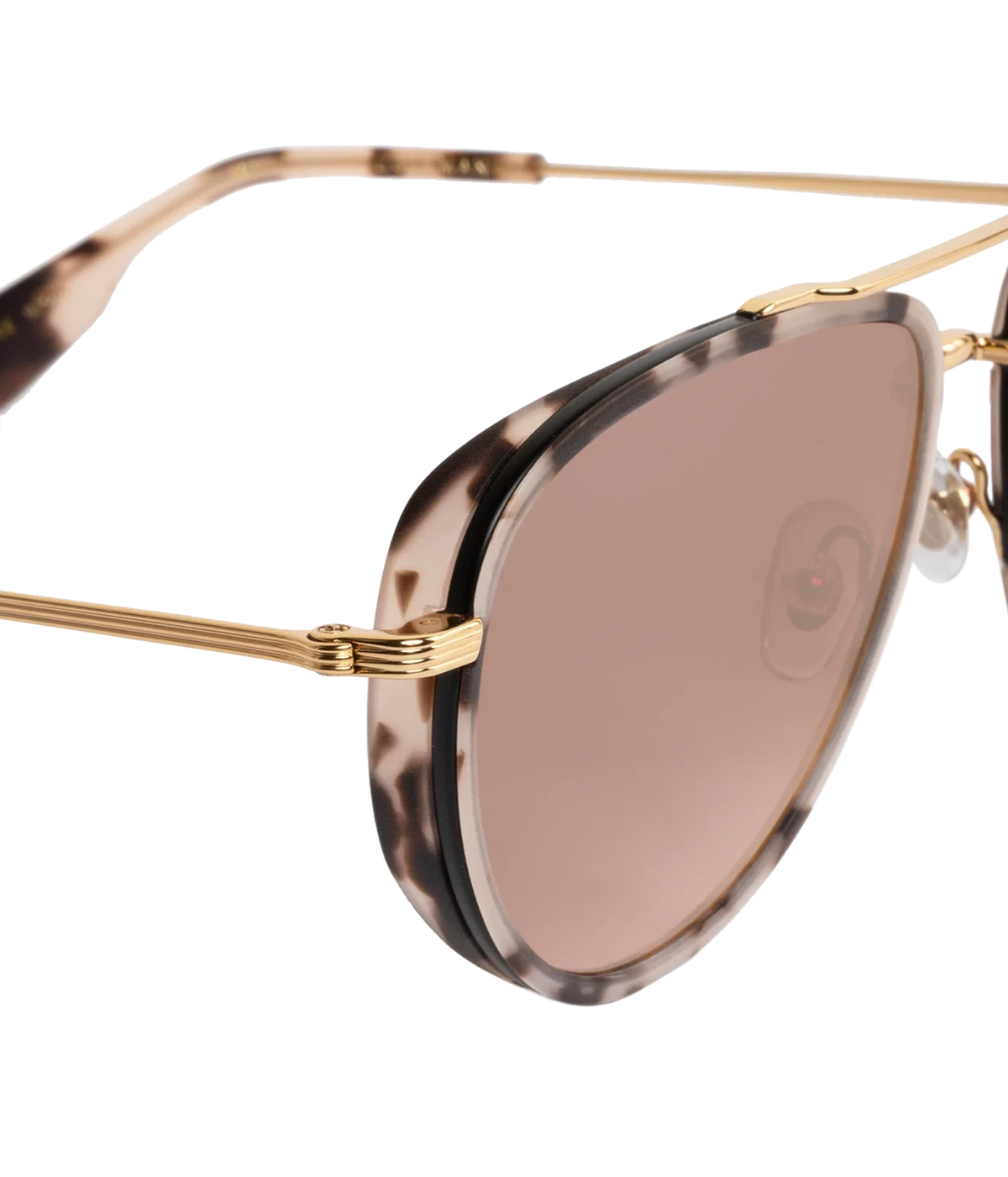 Close-up of the KREWE Coleman Sunglasses in Matte Black Tortoise, showing the acetate mini side shield and gold hinge