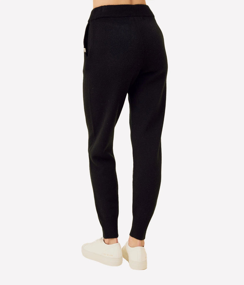 ALT Text: Colorado Cashmere Pant in Black, featuring a mid-gauge weight, adjustable drawstring waist, and functional pockets with branded whip-stitching for a luxurious yet practical design.