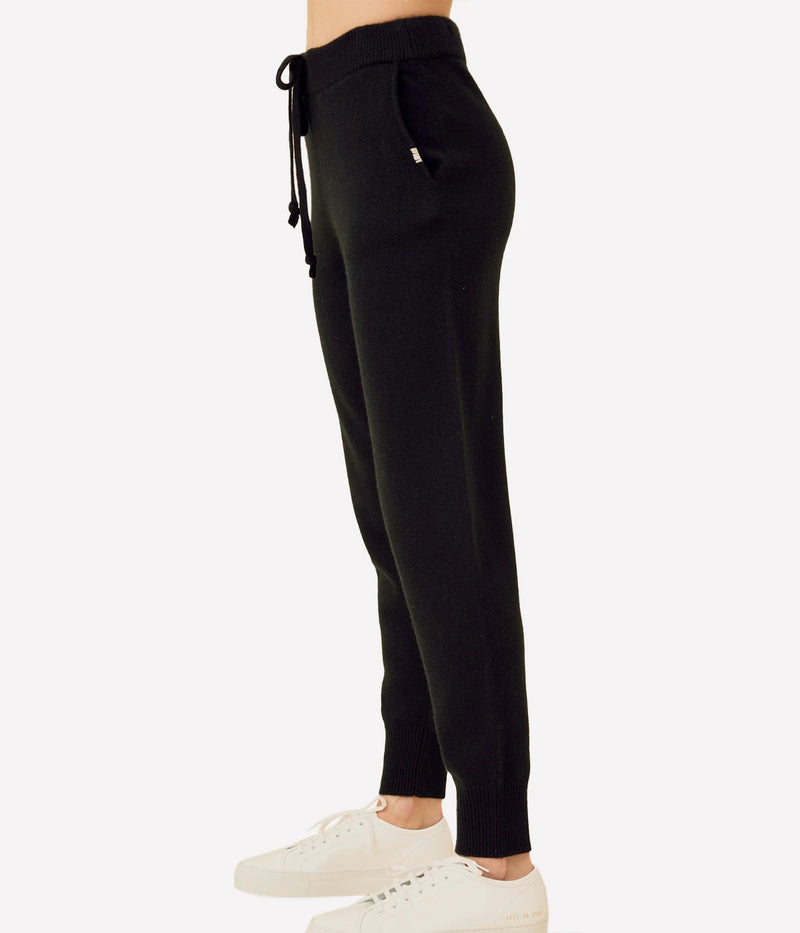 ALT Text: Colorado Cashmere Pant in Black, featuring a mid-gauge weight, adjustable drawstring waist, and functional pockets with branded whip-stitching for a luxurious yet practical design.